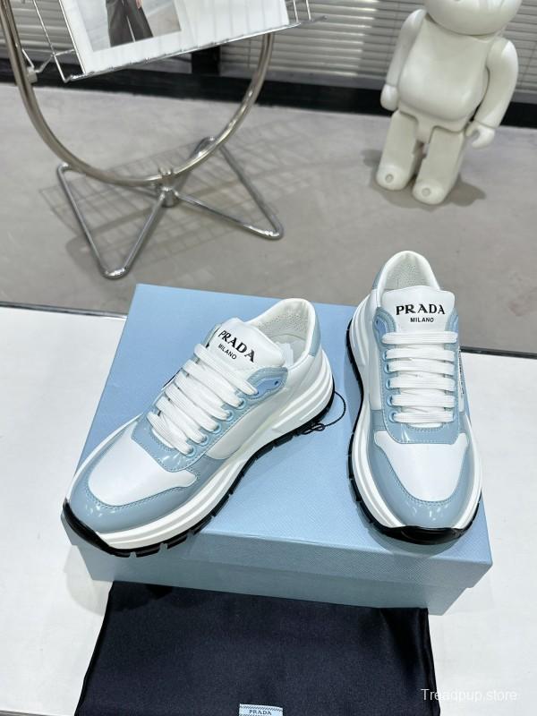 2025 Women Prada Light Blue White Leather Sneakers KFY00310